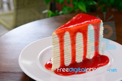 Crepe Cake With Strawberry Sauce Stock Photo