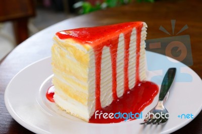 Crepe Cake With Strawberry Sauce Stock Photo