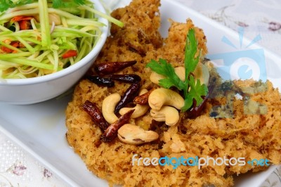 Crispy Catfish Salad With Green Mango Stock Photo