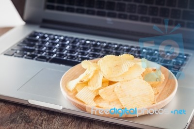 Crispy Potato Chips On Wotk Station Stock Photo