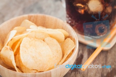 Crispy Potato Chips With Iced Cola Stock Photo