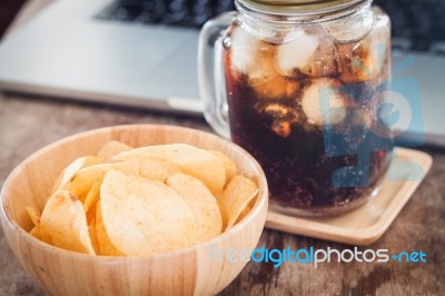 Crispy Potato Chips With Iced Cola Stock Photo