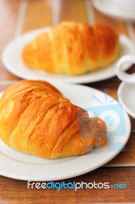 Croissant Bread On Dish Stock Photo