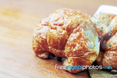 Croissants On Wooden Stock Photo