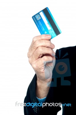 Cropped Image Of A Man Showing Credit Card Stock Photo