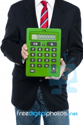 Cropped Image Of Business Guy Holding Calculator Stock Photo