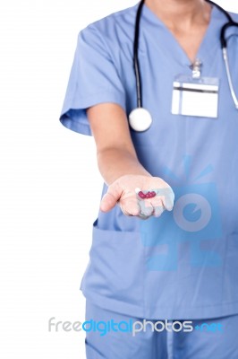 Cropped Image Of Lady With Capsules Stock Photo