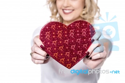 Cropped Picture Of Woman Showing Gift Stock Photo