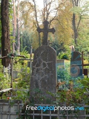 Crosses On Graves Cemetery And Fences  Stock Photo