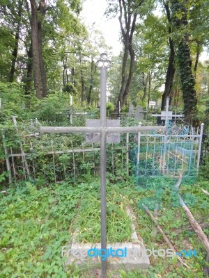 Crosses On Graves Cemetery And Fences   Stock Photo