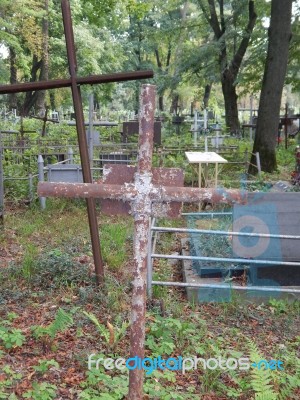 Crosses On Graves Cemetery And Fences   Stock Photo