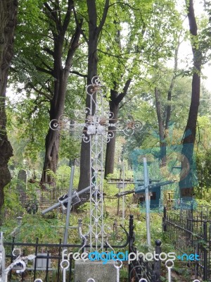 Crosses On Graves Cemetery And Fences   Stock Photo