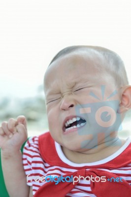 Crying Asian Baby Stock Photo