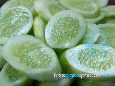 Cucumber Slices As A Background Stock Photo