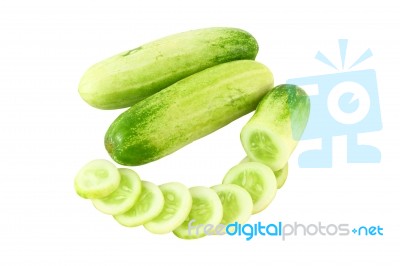 Cucumber Whole And Curve Of Sliced On White Background Stock Photo