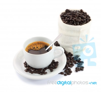 Cup Of Coffee And Bag Beans On White Background Stock Photo