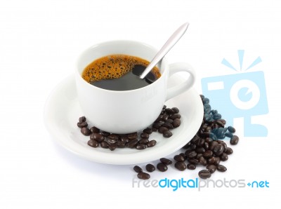 Cup Of Coffee And Beans On White Background Stock Photo