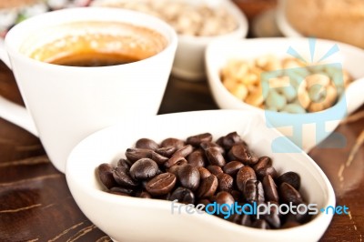 Cup Of Coffee And Coffee Seeds Stock Photo