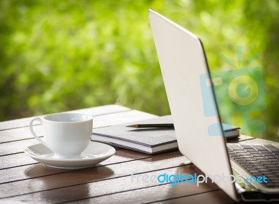 Cup Of Coffee And Laptop Stock Photo