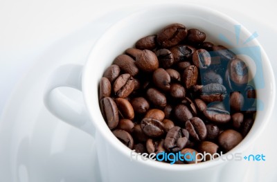 Cup Of Coffee Beans Stock Photo