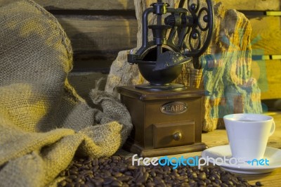 Cup Of Coffee, Coffee-beans, Coffee Grinder, Coffee Sack	 Stock Photo