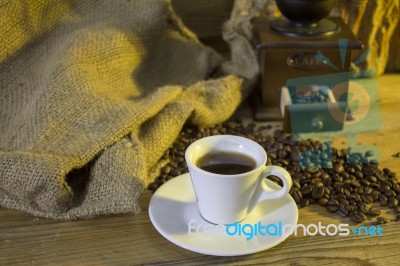 Cup Of Coffee, Coffee-beans, Coffee Grinder, Coffee Sack	 Stock Photo