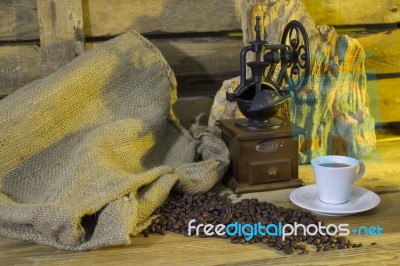 Cup Of Coffee, Coffee-beans, Coffee Grinder, Coffee Sack	 Stock Photo