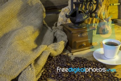 Cup Of Coffee, Coffee-beans, Coffee Grinder, Coffee Sack	 Stock Photo