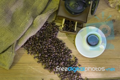 Cup Of Coffee, Coffee-beans, Coffee Grinder, Coffee Sack	 Stock Photo