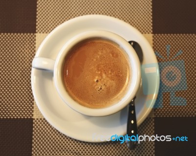 Cup Of Coffee In A White Cup, Selective Focus Stock Photo