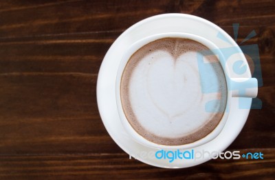 Cup Of Coffee On Table Stock Photo