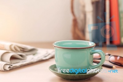 Cup Of Coffee On The Desk Stock Photo