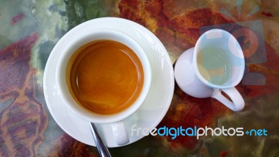 Cup Of Coffee On The Table Stock Photo