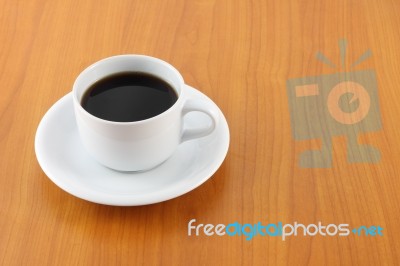 Cup Of Coffee On Wooden Table Stock Photo