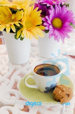 Cup Of Coffee With Flower Stock Photo