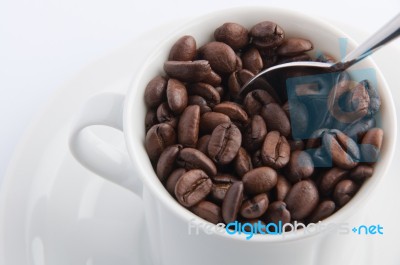 Cup Of Coffee With Spoon Stock Photo