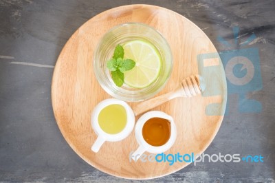 Cup Of Honey Lime Healthy Drink Stock Photo