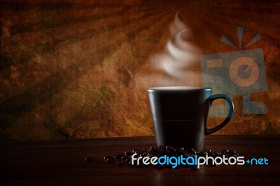 Cup Of Hot Coffee On Vintage Background Stock Photo