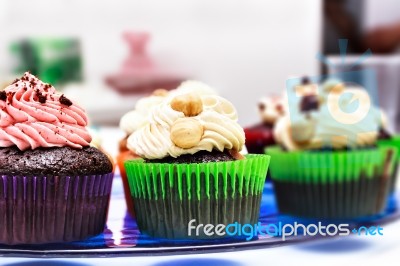 Cupcakes On A Blue Stand Stock Photo