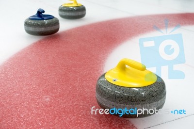 Curling Stones Stock Photo