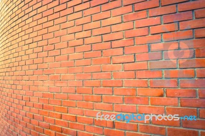 Curve Brown Brick Wall Perspective For  Background Stock Photo