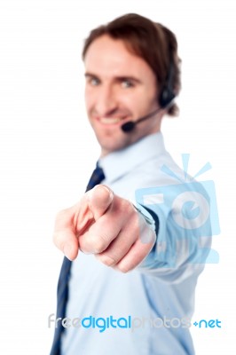 Customer Support Execuitive Pointing You Out Stock Photo