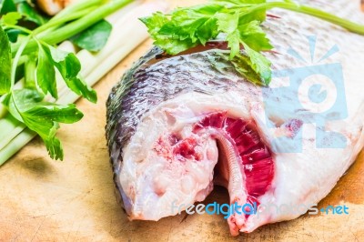 Cut Fish Heads  Preparation Of Food Stock Photo