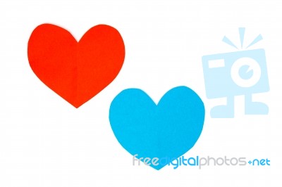 Cut Red And Blue Paper Hearts Together On White Background Stock Photo