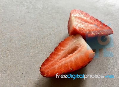 Cut Strawberry On Board Stock Photo