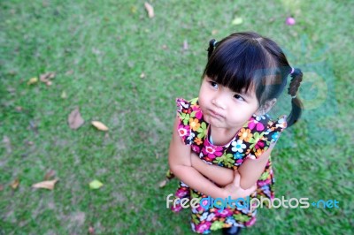 Cute Asian Child Thinking Stock Photo