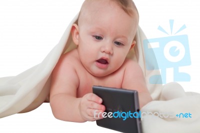 Cute Baby Boy Playing With Mobile Phone Stock Photo