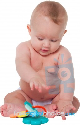 Cute Baby Boy Playing With Toy Stock Photo