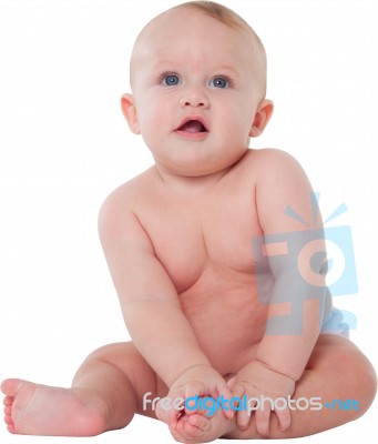 Cute Baby Boy Sitting On White Background Stock Photo