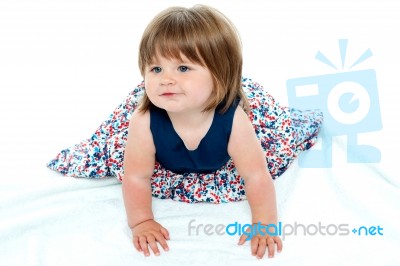 Cute Baby Girl Crawling Stock Photo